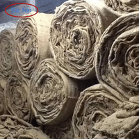 High-tensile wholesale jute sacks for industrial and agricultural packaging stacked in an organized warehouse, showcasing durable 2026 sustainable supply chain materials